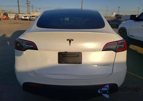 2023 Tesla Model Y from USA, damaged, VIN 7SAYGDEE2PA085770